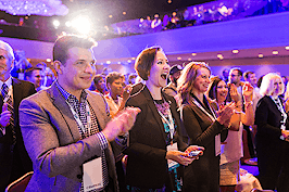 The crowd at Inman Connect New York 2016 standing, smiling and applauding