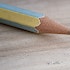 A photo of a pencil and eraser
