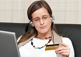 A young woman shopping online.