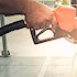 A man fueling up a car