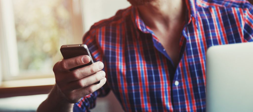 A man using a mobile phone