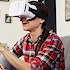 A woman wearing virtual reality goggles