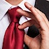 A man adjusting his necktie