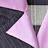 A pink collar in a women's suit