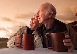 A senior couple enjoying the sunset