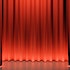 Curtains opening on a stage