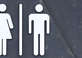 A bathroom sign