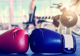 A pair of boxing gloves, red and blue