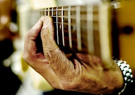 A man playing guitar