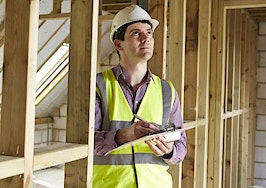 A home inspector in a new property