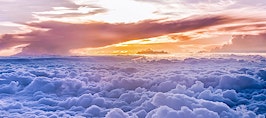 A bird's eye view of the clouds and sunrise