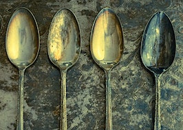 Tarnished spoons on a tarnished tray