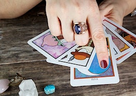 A female fortune teller with Tarot cards