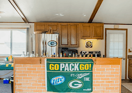 Packer fan party house first to require digital currency blockchain