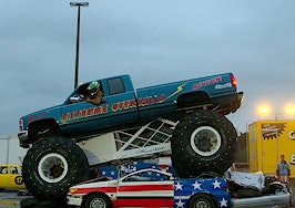 Monster Truck riding over cars