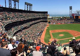 How do sports stadiums impact real estate?