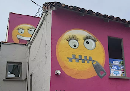 Pink emoji house that caused neighborhood furor up for sale