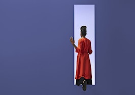 woman exiting purple room